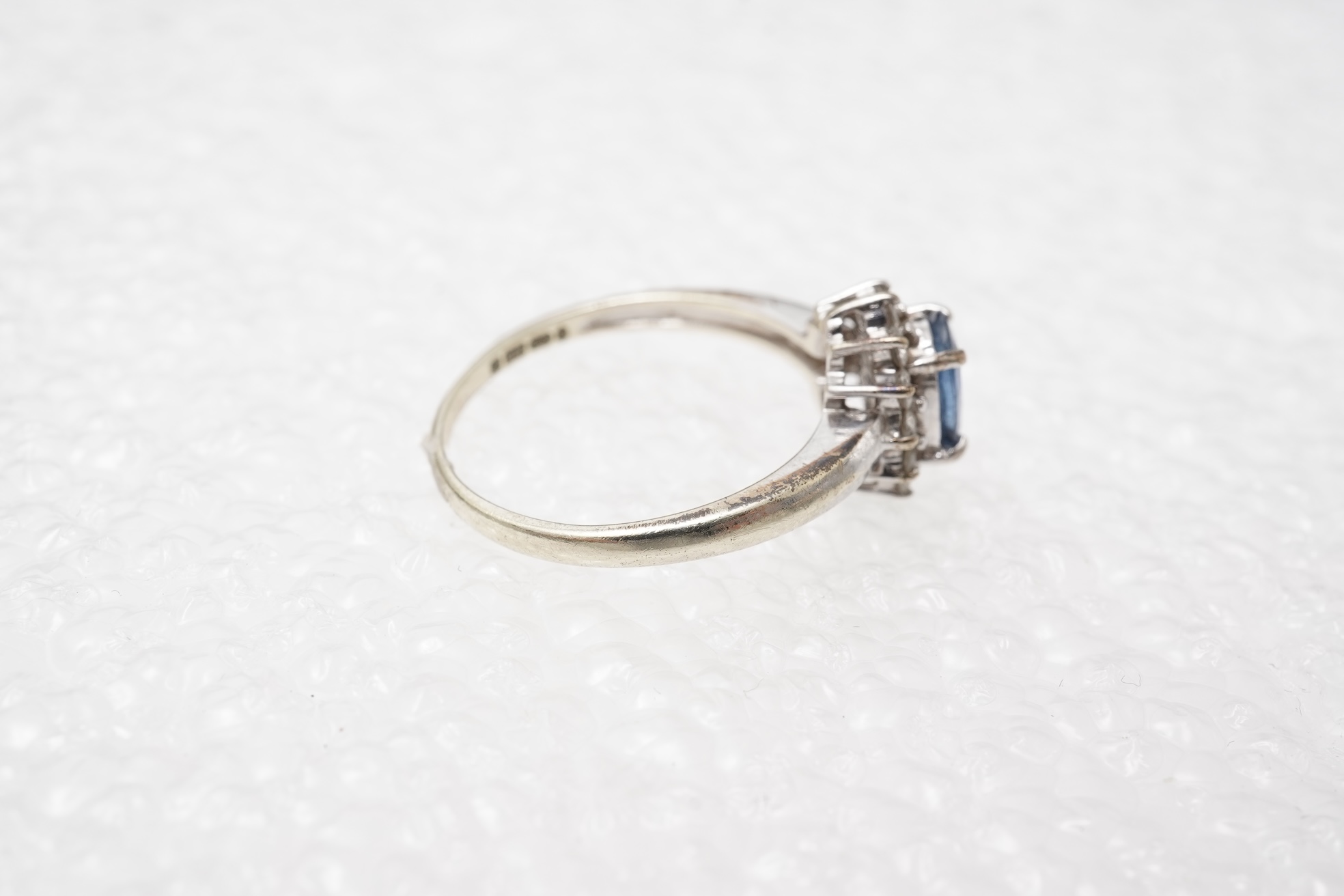 A sapphire and diamond cluster ring